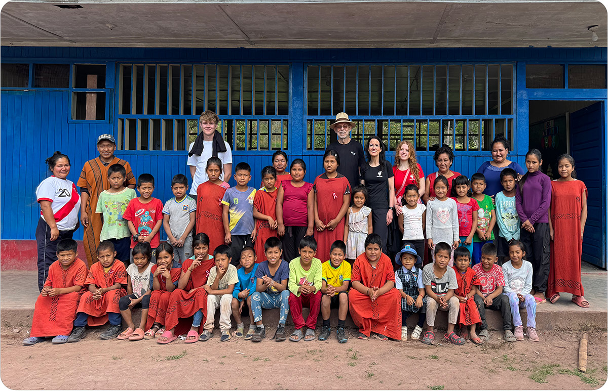 Gruppenfoto_Kinderplaene Deko: Gruppenfoto mit Kaffeebäuerinnen und Kindern